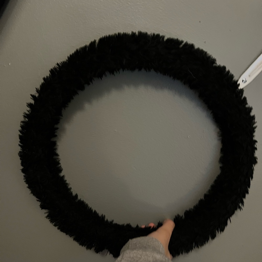 Black fuzzy steering wheel cover